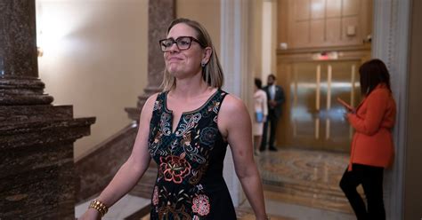 Sinema cites bill targeting leaders of failed banks after criticism of her Wall Street ties